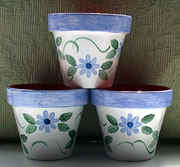 favors/flowers_blue_pot_3.jpg (86390 bytes)