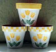 favors/tulips_yellow_pot_3.jpg (86390 bytes)